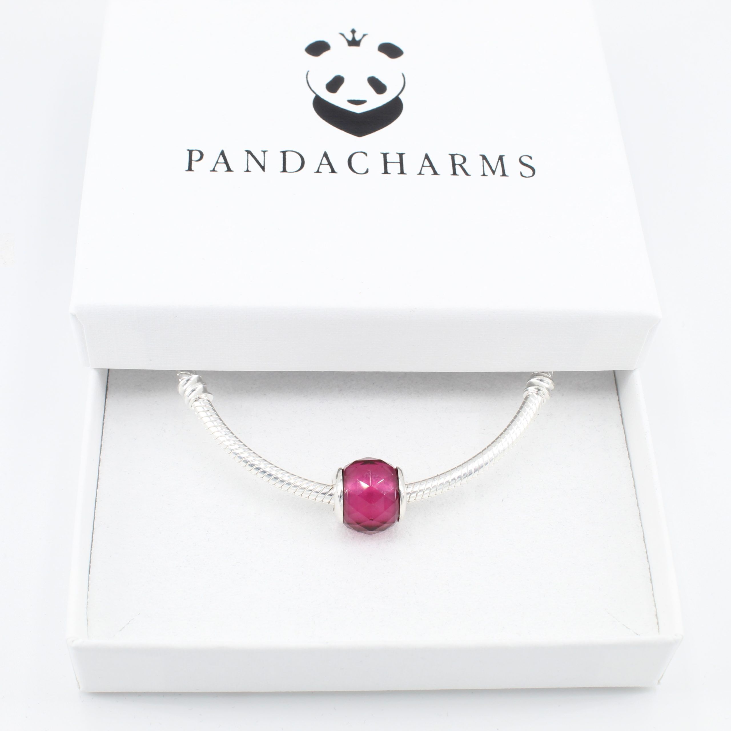 Kleiner Pinker Facettenglas Charm 3 Kleiner Pinker Facettenglas Charm